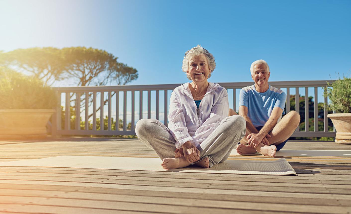 Older adults practicing yoga