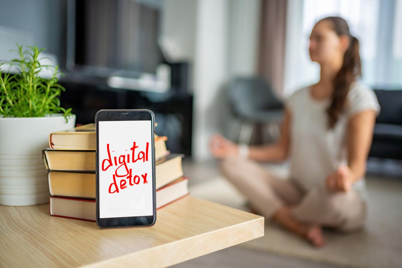 Digital detox concept with yoga
